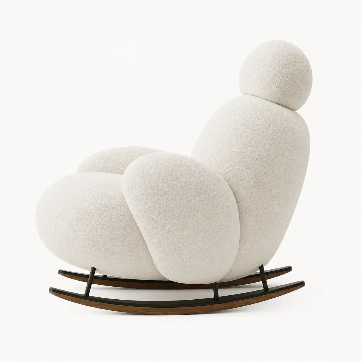 Vue de profil du fauteuil à bascule Nubea blanc ivoire au design organique moderne sur fond clair minimaliste.